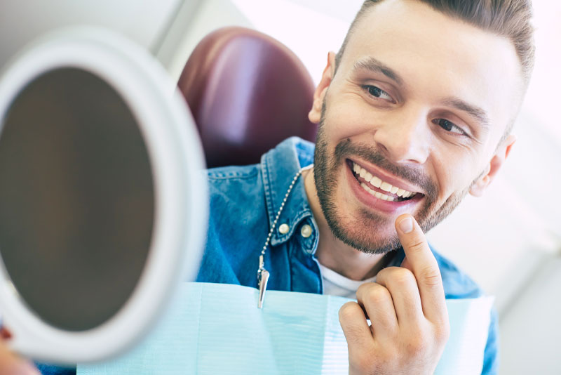 Dental Patient Smiling After His Cosmetic Procedure