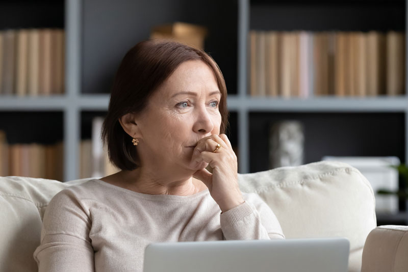 Dental Patient Wondering If She Should Get Dental Implants Or Dentures in Palm Harbor, FL