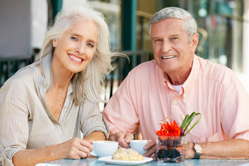 Dental Implant Patients Eating Together With Their False Teeth in Palm Harbor, FL