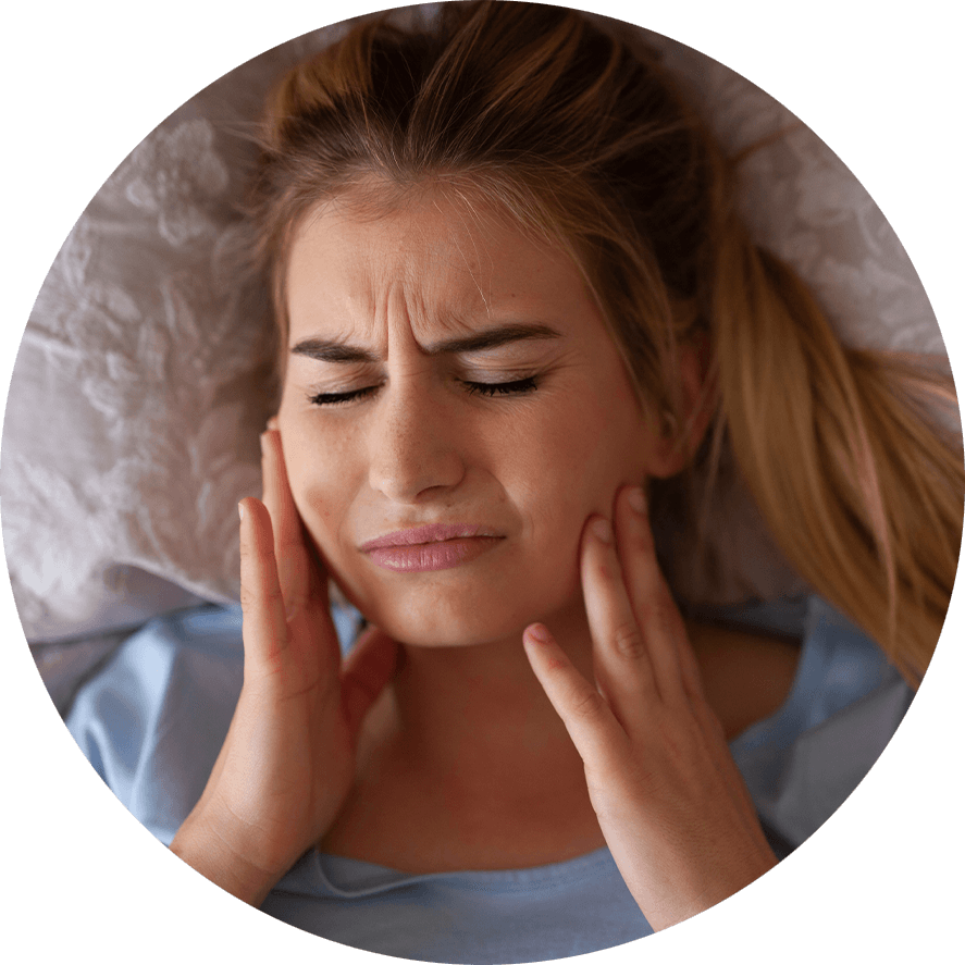 BOTOX patient in pain from TMJ clenching and bruxism